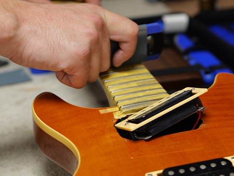 Guitar repairs and guitar maintenance in the renovated workshop of Joh.deHeer Musical Instruments
